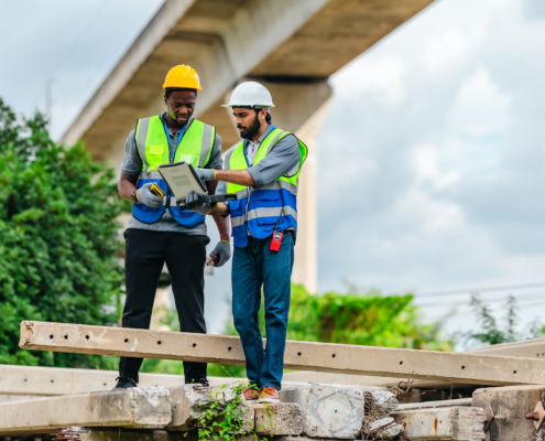 Workers In Hardhats Outside