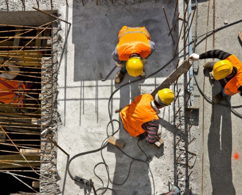Construction Site Workers Aerial Top View